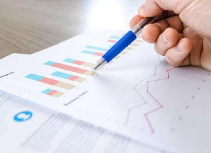 Data and charts on the paper. Photo from unsplash.com